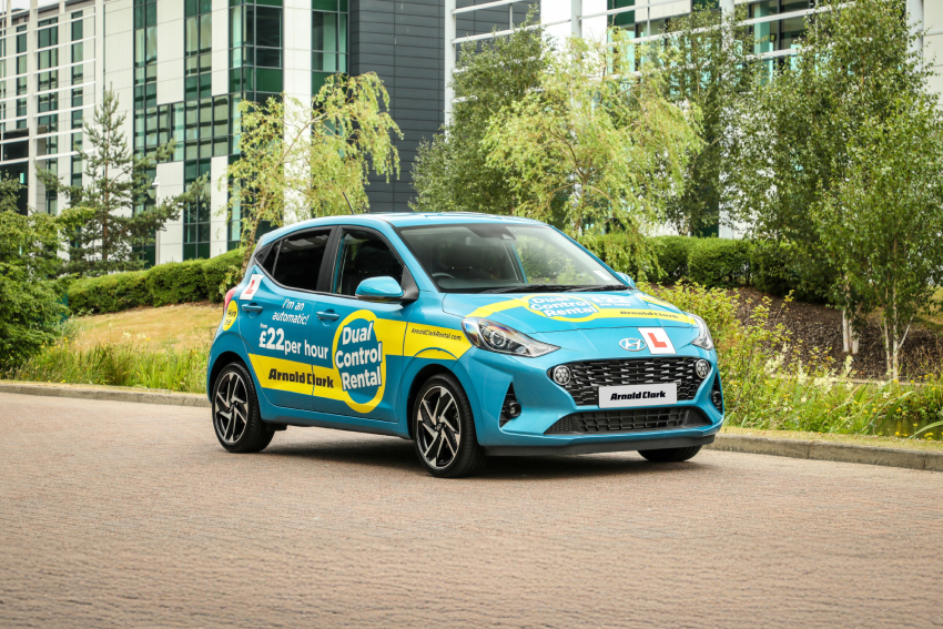 Angled front view of dual-control Hyundai i10 with Learner livery on it